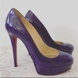 Christian Louboutin Purple Patent Bianca Pumps.